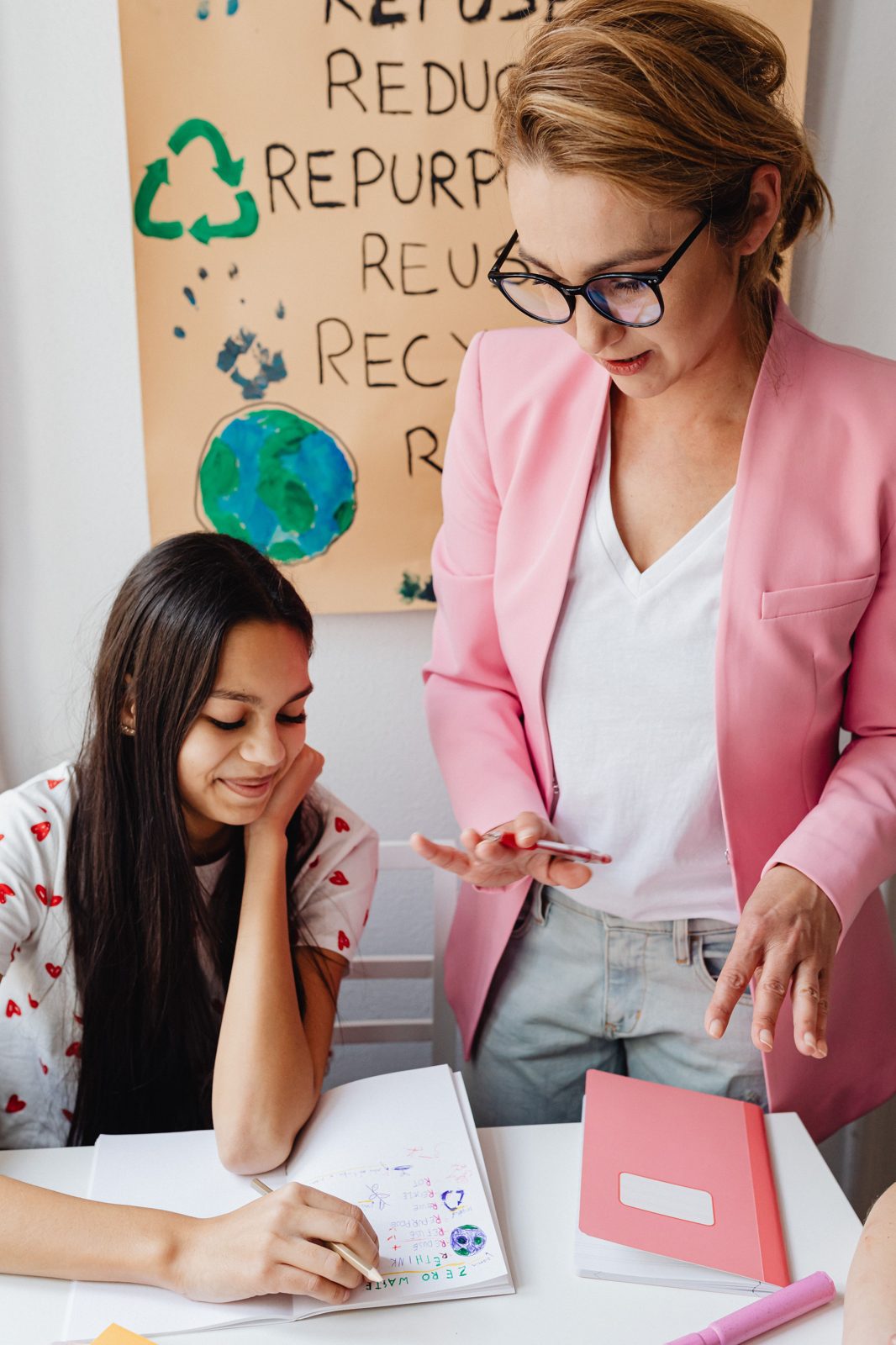 Teacher helping a student